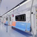 Modern Subway Carriage Interior With Blue Orange Seats And Metal Handrails