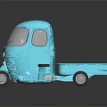 Light Blue Vintage Three Wheeler Truck With Open Cargo Bed And Single Front Wheel