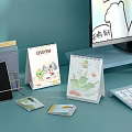 Office Desk With Cartoon Calendar CHIYEN Notebook And Phone Stand