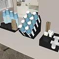 Organized Stacked Coffee Cups with Blue Lids in Black Holder on White Table
