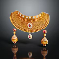 Golden Necklace and Earrings Featuring Red Gemstones Small White Gemstones Teardrop Pendant on Black Background