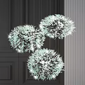 Three Fluffy Crystal Chandeliers Hanging Against Dark Wall Modern Elegant Lighting
