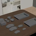 Stainless Steel Tableware Set With Various Plates Bowls And Trays On Wooden Table