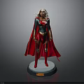 Female Superhero Statue With Green Blue Top Red Cape Boots Gold Details And Black Base