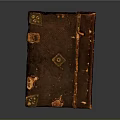 Antique Leather Book Sculpture With Intricate Carved Metal Decorations And Worn Details