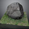 Large Natural Rock Placed On Green Grass Surface With Small Flowers