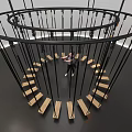 Art Installation With Circular Black Ropes Wooden Platforms And Visitor Interaction