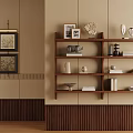 Beige Wall Interior Featuring Wooden Bookcase With Decor Books Sculptures And Vases