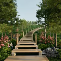 Scenic Wooden Pathway With Steps Lined By Trees And Pink Flowers