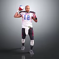 Man Posing In White Jersey With Number 12 Holding Red Blue White Sports Ball