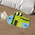 Crocodile Shaped Kids Rug With Colored Pencils And Drawing Paper On Wooden Floor