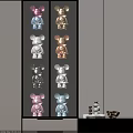 Colorful Bear Sculptures In Various Metallic Hues On Multi Tiered Display Shelf