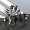 Modern Metallic Single Chair With Sculptural Curved Legs And Shiny Surface