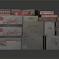 Stacked Assorted Branded Food Packages With Apples Jaffas Kool Labels