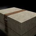 Decorative Ornament Set With Gray Textured Box Brown Strap And Metal Clasp