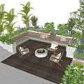 Outdoor Sofa With Cushions On Wooden Deck Surrounded By Palm Trees Flowers And Fire Pit