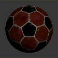Classic Red And Black Soccer Ball With Hexagonal Textured Surface For Daily Use
