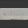 Four Concrete Curbs With Different Colors And Surface Markings On Dark Background