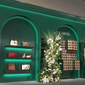 Gucci Store Floral Display With Green Background Arched Doorways And Luxury Bags Shoes