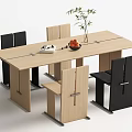 Modern Dining Table Set With Wooden Top Black And Beige Chairs Fruit Vase And Book