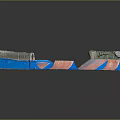 Colorful Skateboard Ramp Structure With Blue Pink Slopes And Weathered Surfaces