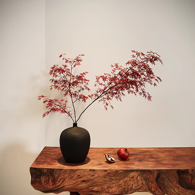 Black Ceramic Vase With Red Maple Branches On Wooden Table And Sliced Pomegranate White Wall 3d model
