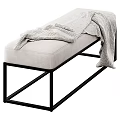 Modern Beige Upholstered Sofa Bench With Black Metal Frame And Throw Blanket