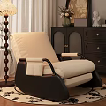 Cozy Beige Single Seater Sofa With Black Armrest Floor Lamp And Dark Cabinet Decor