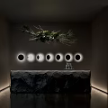 Front Desk Reception With Modern Stone Countertop Circular Lights On Background Wall And Hanging Plant