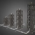 Industrial Equipment Featuring Multiple Tall Metal Frame Towers With Interconnected Piping And Ladders