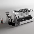Stainless Steel Kitchen Appliances Featuring Espresso Machine Coffee Grinder And Glass Bottles