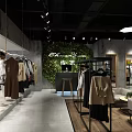Modern Clothing Store Interior With Trendy Apparel Displays And Comfortable Seating Area