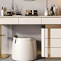 Modern Dressing Table With Round Mirror Gold Accents White Countertop Pendant Lights And Green Plants