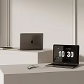 Modern Laptop Display Featuring Open And Closed Notebooks With Screen Time And Accessories On Stand