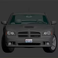 Gray Sporty Sedan With Sleek Design Black Wheels And Front Grille Reflection