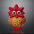 Colorful Red And Yellow Toy Figure With Big Eyes And Textured Surface