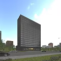Modern City Building Complex With Tall Glass Office Tower Surrounding Trees Cars And Clear Sky