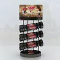 Multi tiered Display Rack With Black Bottles Red Labels And Crispy Chicken Advertising Board