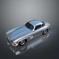 Silver Classic Sports Car With Sleek Body And Vintage Design Elements