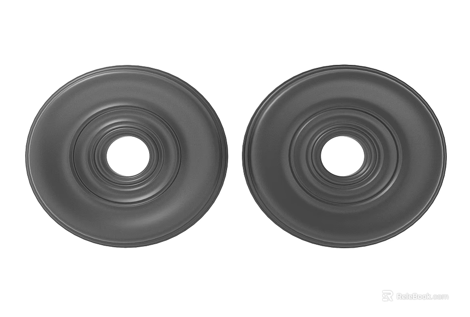 Two Black Circular Carved Intricate Home Decor Accents With Concentric Patterns 3d model 