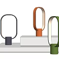 Modern Minimalist Table Lamps In Black Orange Green With Circular Design On White Platforms