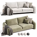 Light Gray And Green Two Seater Sofa With Decorative Pillows And Blanket