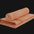 Two Orange Towels with Wavy White Pattern Folded and Rolled