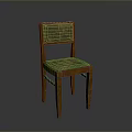 Vintage Chair With Green Patterned Backrest Upholstered Seat And Wooden Legs Design