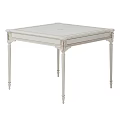 Elegant White Square Dining Table With Carved Legs And Ornate Design Details
