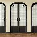 Black Framed Arched Top Casement Doors with Glass Panes and Light Colored Walls