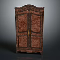 Antique Wooden Wardrobe Design With Double Doors And Ornate Carvings And Gold Handles