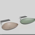 Two Oval Shaped Pastel Pink And Mint Green Washbasins With Metal Stands And Countertops