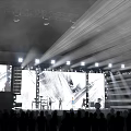 Fashion Runway Show with Bright Stage Lights Large Screen Models Live Band and Audience