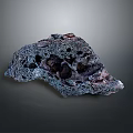 Natural Dark Stone and Wood Decorative Piece with Holes and Textured Surface